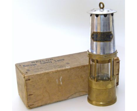 A Naylor GarageÂ safety lamp in brass with original packaging and safety instructions, spare wick included Unfortunately we a