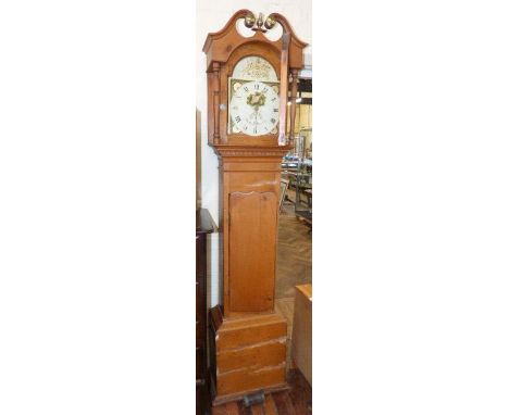 A 30-hour, pine long-case clock with enamel dial by Tho. Davies, Llanelly Unfortunately we are not doing condition reports fo
