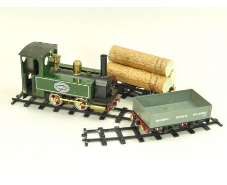 MAMOD RS1 SET. A Mamod RS1 live steam locomotive, wagons & track set in original box with a quantity of extra track. Untested