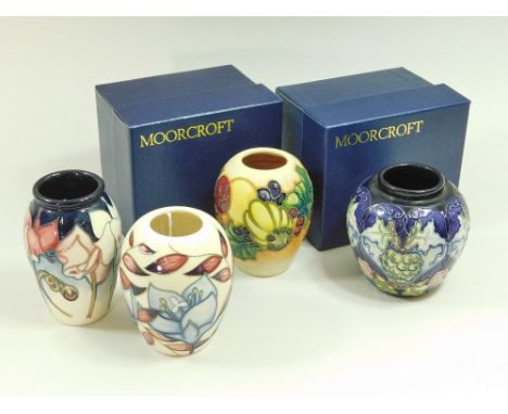 MOORCROFT. Four modern Moorcroft vases: Christmas Bounty, signed by Kay Goodwin, 9.5cm with original box; Wild Cyclamen, heig