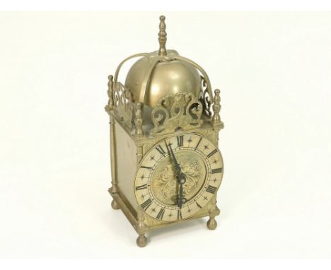 MODERN LANTERN CLOCK. A modern 'floating balance' lantern clock by Smiths.Please note: All watches and clocks are antique, se