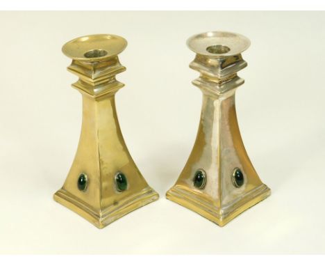 ARTS & CRAFTS. A Pair of Scottish Arts & Crafts candlesticks, stamped J.B. Glasgow, set with oval green cabochons. Each stamp
