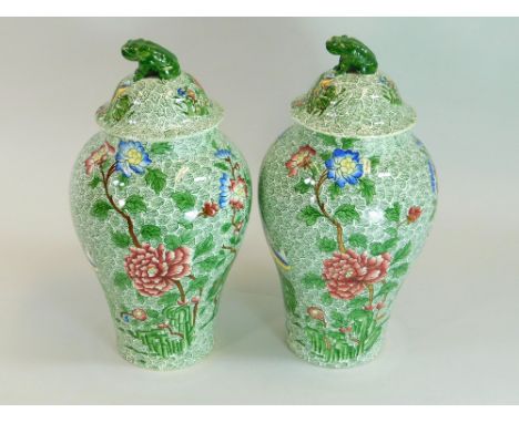 COPELAND SPODE. A pair of Copeland late Spode Chinoiserie style jars & covers with Dogs of Fo finials. Height 30cm.WE CANNOT 