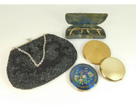 HANDBAG ETC. A vintage beaded evening bag, made in Hong Kong, three gold tone powder compacts (two by Stratton) & a pair of v