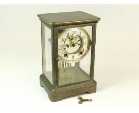 REGULATOR MANTEL CLOCK. A 19th century four glass regulator mantel clock pendulum & open escapement, with key. Height 24.5cm.