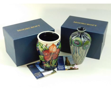 MOORCROFT. Two modern Moorcroft vases, one in the Simeon pattern dated '99. Sold with leaflet, original box & sleeve, height 