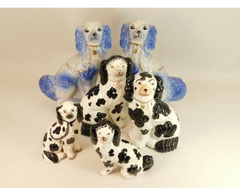 STAFFORDSHIRE DOGS. SIx 19th century Staffordshire dogs including a large pair sprayed in blue, height 32cm. Also, four other