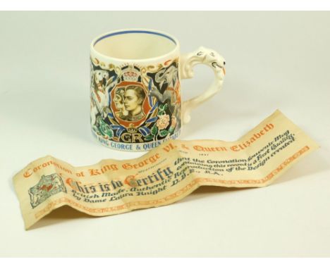 LAURA KNIGHT. A 1937 Coronation mug after a design by Dame Laura Knight. Sold with the original printed leaflet, dated 1937.W