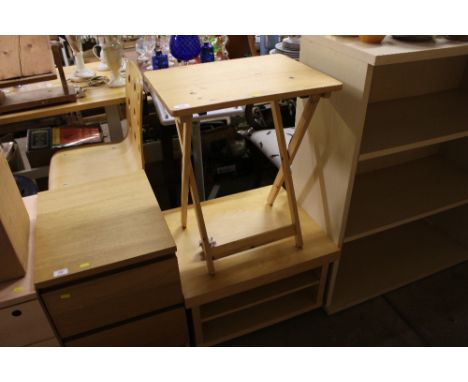 A low shelf unit; and a pine folding table 