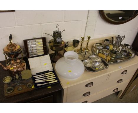 A large collection of metalware to include silver plated tray, various teaware, oil lamp, copper spirit kettle, postage scale