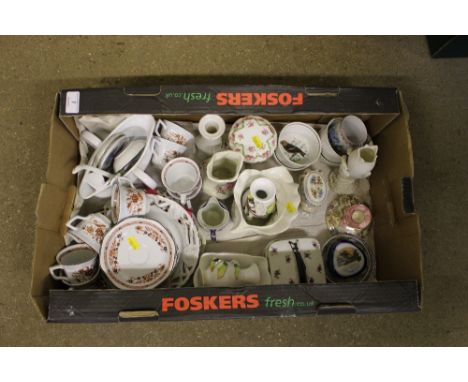 A box of decorative china to include Wedgwood coffee cans and saucers