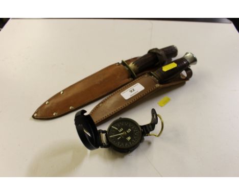 Two hunting knives and a compass 