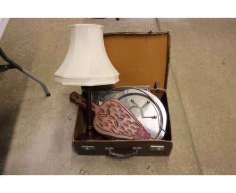 A suitcase containing a pair of bellows, table lamp etc. 