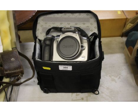 A Canon EOS 300D digital camera, body with carrying bag