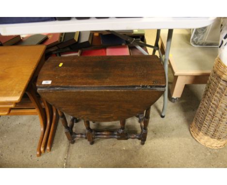 An oak gate leg coffee table 