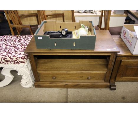 An Ercol tv stand fitted single drawer 