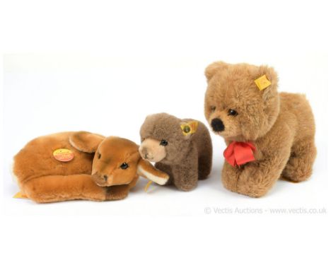 Steiff two plush teddy bears and a deer fawn: (1) Steiff Drolly bear, yellow tag 5750/22 081255, 1991, brown plush, with ches