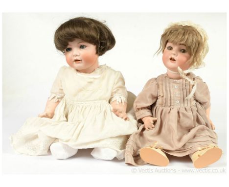 Pair of German antique bisque dolls: (1) Baehr &amp; Proeschild antique bisque character baby doll, German, c.1912, impressed