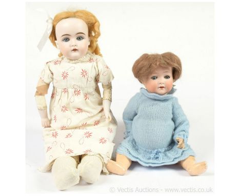 Pair of antique German bisque dolls: (1) J D Kestner jnr bisque shoulder head doll, German, c1885, impressed 8 148, weighted 