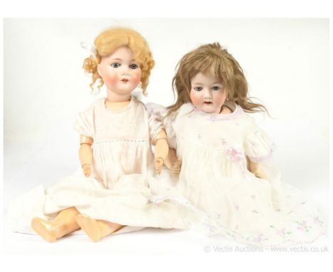 Pair of German antique bisque dolls: (1) Ernst Heubach antique bisque doll, German, c1922, impressed Heubach Koppelsdorf 302 