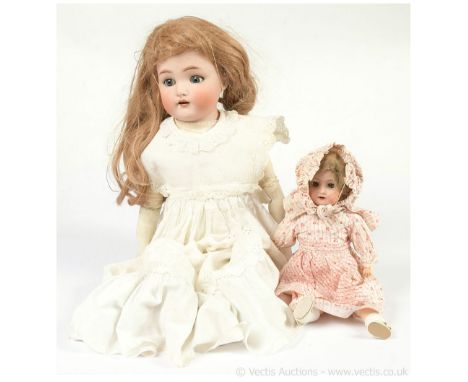 Pair of antique German bisque dolls: (1) Simon &amp; Halbig / Kammer &amp; Reinhardt bisque shoulder head doll, German, c1900