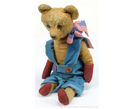 American 20th century early mohair teddy bear. Replacement button eyes, inserted black cloth nose, fully jointed, loss of moh