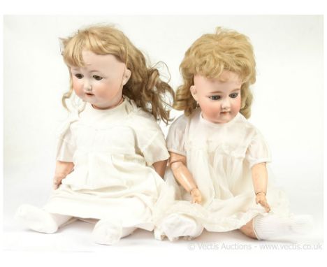 Pair of German antique bisque dolls: (1) Armand Marseille antique bisque character baby doll (for Otto Gans), German, c1922, 
