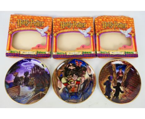 Royal Doulton - Three boxed Harry Potter wall plates, # HPWP4 The Mirror Holds The Answer,  # HPWP1 The Wild Ride Under Gring