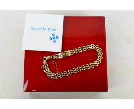 A 9ct yellow gold gate link bracelet set with three small diamonds, approximately 18 cm (l), 7.5 grams all in, contained in p