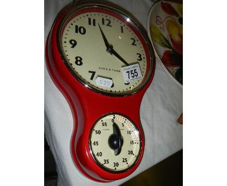 A retro style kitchen clock/timer.*CONDITION REPORT*Made of plastic.Quartz movement working.Timer working.