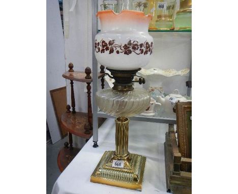 A Victorian oil lamp.
