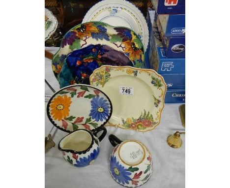 A mixed lot of ceramic plates.