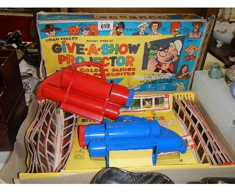 A 'Give A Show' projector (Popeye).