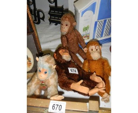 Four vintage monkey's.