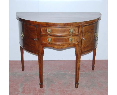 Antique inlaid mahogany bowfront sideboard in the George III style, with two short central drawers flanked by cupboard doors 