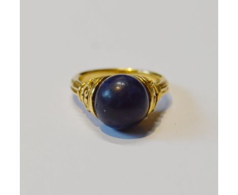 Greek 18ct gold ring of Etruscan style by Illias Lalaounis with lapis ball between pierced cups, Import Marks, 7.3g gross, ap