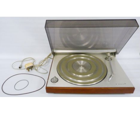 Bang & Olufsen of Denmark Beogram 3000 record player with teak finish.CONDITION REPORT: When plugged in the light comes on an