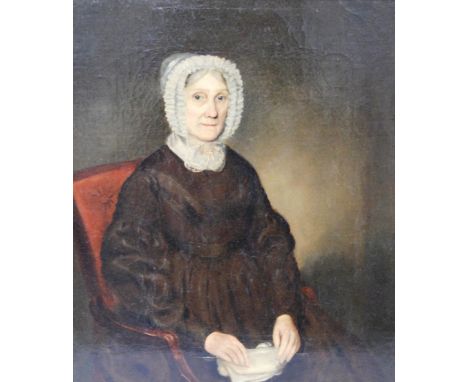 19th Century British School Portrait of seated old woman wearing a lace bonnet with her sewing, half length Oil on canvas, 48