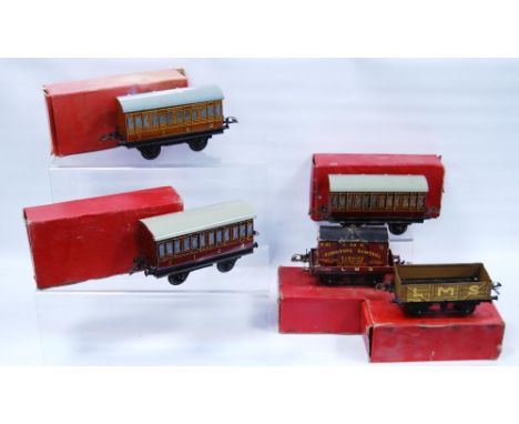 Five Hornby by Meccano O gauge coaches and wagons comprising two French Voiture no. 1 coaches, 3113, LMS 12530 wagon no. 1, f