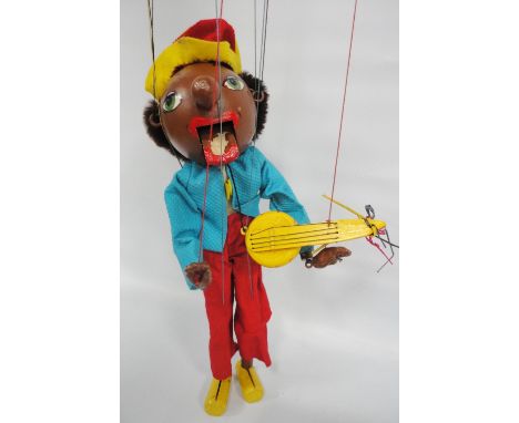 Pelham puppet, 'Nigger Minstrel', c. 1950s, with original box. 