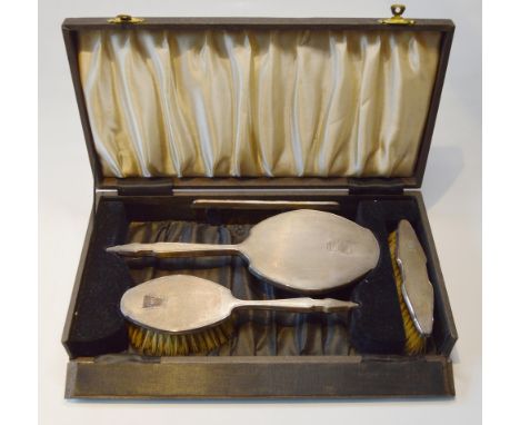 Silver engine turned toilet set, cased.