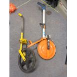Nedo and a Trumeter lightweight collapsible measuring wheels with carry cases