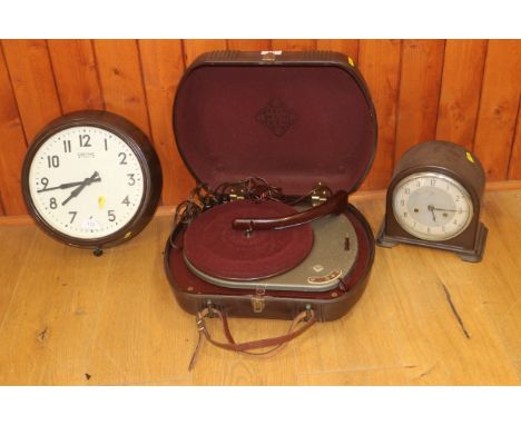 A Telefunken portable record player in Bakelite case, a similar wall clock and a mantel clock