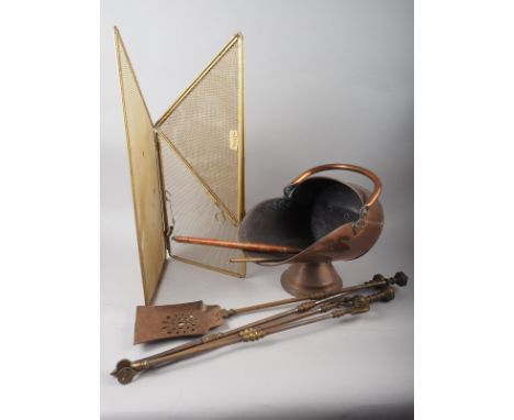 A copper coal scuttle, fire irons, two toasting forks and a brass fire screen 