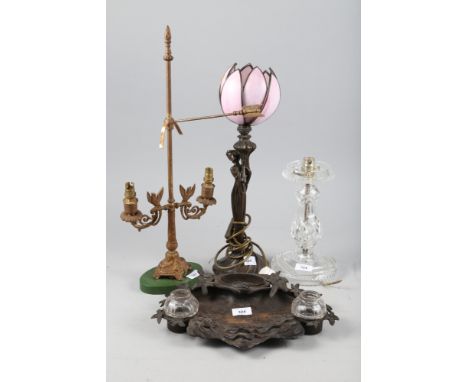 An Art Nouveau design table lamp with pink flower shade, 18 1/2" high, a cut glass table lamp, a cast metal inkwell and other