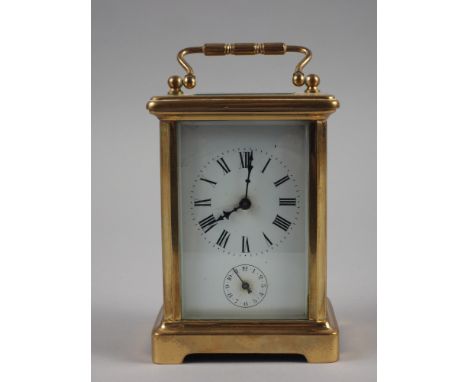 A French brass cased carriage clock with alarm 