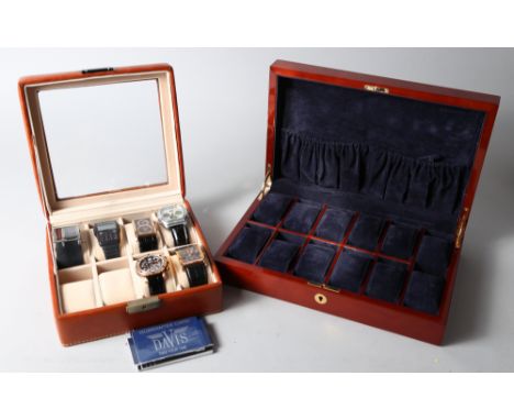 A watch collector's twelve-division Buben and Zorbeg "Ambassador" polished burr elm lockable case, a brown leather eight-divi
