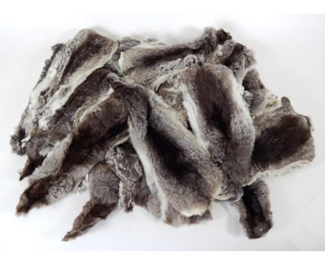 Hides/Pelts: Chinchilla (Chinchilla lanigera), modern, twenty-five farmed light grey/black pelts, various sizes (25)
