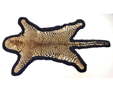 Taxidermy: African Leopard (Panthera pardus), circa 1920-1930, flat skin rug, with cushioned flat head, with shortened limbs 
