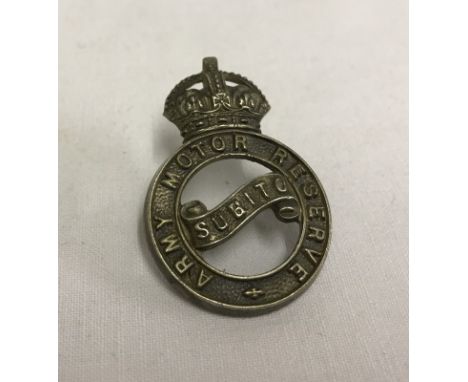 An Army Motor Reserve Kings Crown cap badge.  